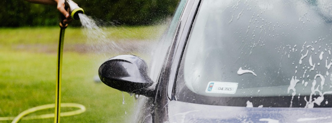 A stock photo of a car being washed.